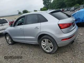 2018 Audi Q3 Premium with VIN WA1BCCFSXJR003408, listed as a Copart auction lot 60112115 with 128,146 mi miles and Salvage title. Bid and sale history available at DreamBid. Image 2.