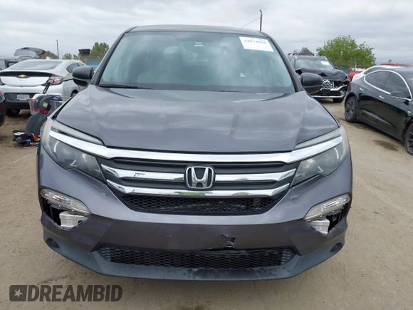 2016 Honda Pilot LX with VIN 5FNYF5H14GB037205, listed as a IAAI auction lot 42034018 with 101,943 mi miles and . Bid and sale history available at DreamBid. Image 12.
