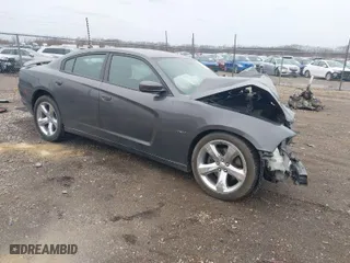 2014 Dodge Charger RT Plus with VIN 2C3CDXCT6EH159466, listed as a IAAI auction lot 41717142 with 104,462 mi miles. Bid and sale history available at carsss.com. Image 1.