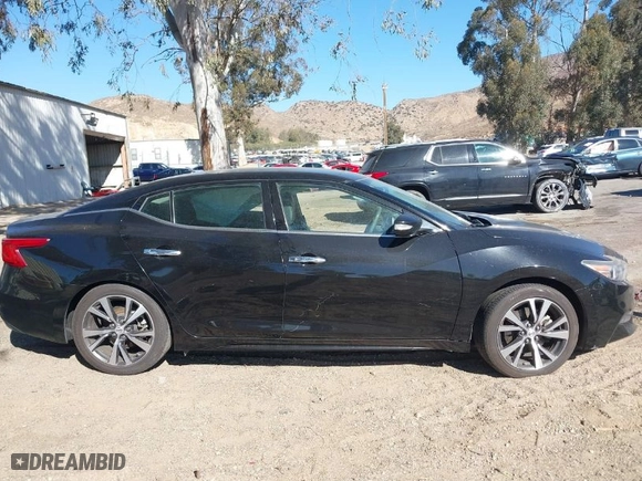 2017 Nissan Maxima SR with VIN 1N4AA6AP4HC406136, listed as a IAAI auction lot 41355573 with 112,111 mi miles. Bid and sale history available at carsss.com. Image 12.