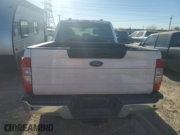 2020 Ford F-250 XL with VIN 1FT7W2A64LEC12385, listed as a Copart auction lot 77958334 with 122,635 mi miles and Salvage title. Bid and sale history available at DreamBid. Image 6.