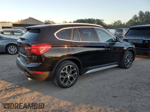 2021 BMW X1 xDrive28i with VIN WBXJG9C07M5T06155, listed as a Copart auction lot 81357474 with 18,466 mi miles and Salvage Title. Bid and sale history available at carsss.com. Image 3.