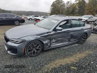 2021 BMW 5 Series M550i xDrive z VIN WBA13BK04MCG79652, wystawiony jako Copart lot #80876964 z przebiegiem 23 140 mil mil oraz Szkoda całkowita • Salvage title. Historia ofert i sprzedaży dostępna na DreamBid. Obrazek 1.