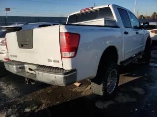 2012 Nissan Titan SV with VIN 1N6AA0EC1CN326088, listed as a Copart auction lot 42799335 with 163,218 mi miles and Salvage Title. Bid and sale history available at carsss.com. Image 3.