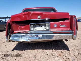 1991 Cadillac DeVille z VIN 1G6CD53B8M4347542, wystawiony jako Copart lot #48966595 z przebiegiem 153 152 mil mil oraz Szkoda całkowita • Salvage title. Historia ofert i sprzedaży dostępna na DreamBid. Obrazek 6.