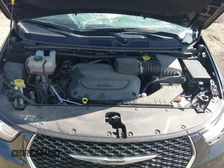 2023 Chrysler Pacifica Touring L with VIN 2C4RC1BG9PR628170, listed as a IAAI auction lot 42515590 with 41,987 mi miles and . Bid and sale history available at DreamBid. Image 10.