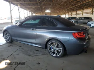 2015 BMW 2 Series M235i with VIN WBA1J7C59FV253506, listed as a Copart auction lot 49506005 with 73,628 mi miles and Clean Title. Bid and sale history available at carsss.com. Image 2.