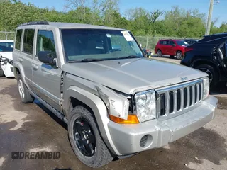 2007 Jeep Commander Sport z VIN 1J8HG48K07C559271, wystawiony jako IAAI lot #42032853 z przebiegiem 236 443 mil mil oraz . Historia ofert i sprzedaży dostępna na DreamBid. Obrazek 1.