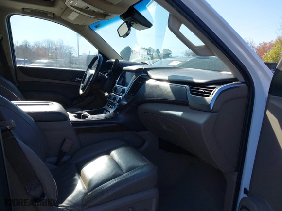 2019 Chevrolet Tahoe LT with VIN 1GNSKBKC7KR307869, listed as a IAAI auction lot 41833834 with 127,949 mi miles. Bid and sale history available at carsss.com. Image 5.