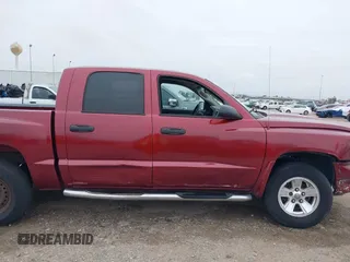 2006 Dodge Dakota SLT with VIN 1D7HE48KX6S598831, listed as a IAAI auction lot 41292884 with 173,181 mi miles and . Bid and sale history available at carsss.com. Image 13.