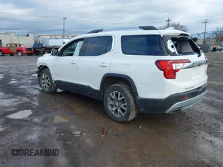 2020 GMC Acadia SLT with VIN 1GKKNULS8LZ124343, listed as a IAAI auction lot 41245060 with 100,436 mi miles and . Bid and sale history available at DreamBid. Image 3.