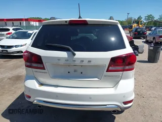 2016 Dodge Journey Crossroad Plus z VIN 3C4PDCGG4GT154134, wystawiony jako IAAI lot #42124659 z przebiegiem 101 700 mil mil oraz . Historia ofert i sprzedaży dostępna na DreamBid. Obrazek 16.