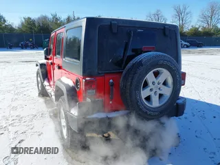 2018 Jeep Wrangler JK Unlimited Sport with VIN 1C4BJWDG9JL874850, listed as a IAAI auction lot 41482613 with 80,669 mi miles. Bid and sale history available at carsss.com. Image 3.
