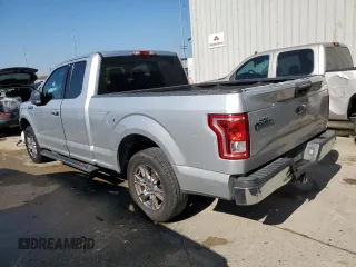 2015 Ford F-150 XL with VIN 1FTEX1C88FFC26544, listed as a Copart auction lot 48242705 with 124,731 mi miles and Salvage Title. Bid and sale history available at carsss.com. Image 2.