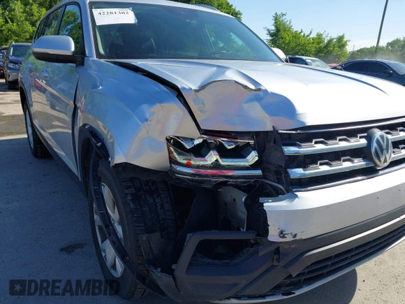 2019 Volkswagen Atlas SE with VIN 1V2UR2CA2KC557449, listed as a IAAI auction lot 42281302 with 106,739 mi miles and . Bid and sale history available at DreamBid. Image 6.