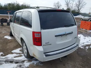 2010 Dodge Grand Caravan SXT with VIN 2D4RN5D18AR218903, listed as a IAAI auction lot 41560484 with Not Provided miles and . Bid and sale history available at DreamBid. Image 3.