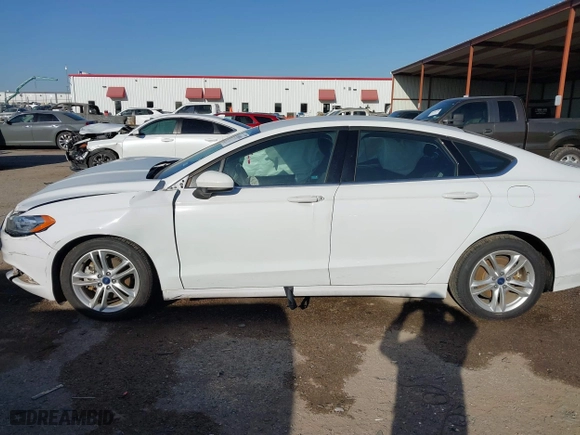 2018 Ford Fusion Hybrid SE with VIN 3FA6P0LU7JR188124, listed as a IAAI auction lot 41760184 with 74,731 mi miles. Bid and sale history available at carsss.com. Image 14.