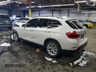 2014 BMW X1 xDrive28i with VIN WBAVL1C51EVY12411, listed as a Copart auction lot 44966055 with 76,462 mi miles and Salvage Title. Bid and sale history available at carsss.com. Image 2.