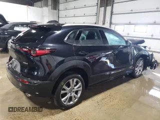 2023 Mazda CX-30 S Premium with VIN 3MVDMBDM0PM520591, listed as a Copart auction lot 48178215 with 9,999 mi miles and Salvage Title. Bid and sale history available at DreamBid. Image 3.