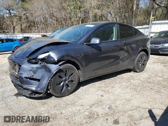 2024 Tesla Model Y Long Range z VIN 7SAYGDEE3RA323029, wystawiony jako Copart lot #50171805 z przebiegiem Nie podano mil oraz Szkoda całkowita • Salvage title. Historia ofert i sprzedaży dostępna na DreamBid. Obrazek 1.