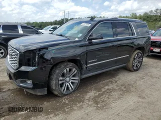 2019 GMC Yukon Denali with VIN 1GKS1CKJ0KR259491, listed as a Copart auction lot 51071335 with 105,294 mi miles and Salvage Title. Bid and sale history available at carsss.com. Image 1.