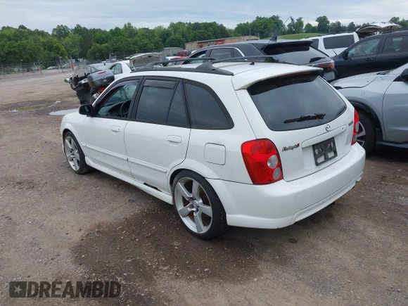 2002 Mazda Protege with VIN JM1BJ245021508764, listed as a IAAI auction lot 42198285 with 237,386 mi miles and . Bid and sale history available at DreamBid. Image 3.