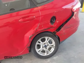2014 Ford Fiesta SE with VIN 3FADP4BJ1EM210630, listed as a IAAI auction lot 42117897 with 102,553 mi miles and . Bid and sale history available at DreamBid. Image 6.