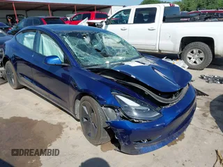 2023 Tesla Model 3 with VIN 5YJ3E1EA8PF403743, listed as a IAAI auction lot 42076747 with 58,399 mi miles and . Bid and sale history available at DreamBid. Image 1.
