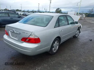 2004 Toyota Avalon XL with VIN 4T1BF28B44U364702, listed as a IAAI auction lot 41473272 with 226,845 mi miles. Bid and sale history available at carsss.com. Image 4.