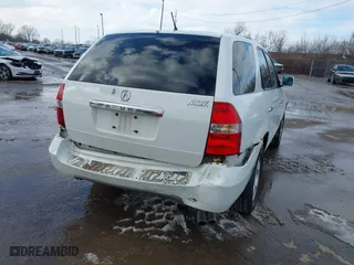 2003 Acura MDX with VIN 2HNYD18213H508572, listed as a IAAI auction lot 41521463 with 214,161 mi miles. Bid and sale history available at carsss.com. Image 6.