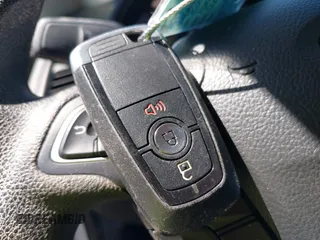 2021 Ford EcoSport SE with VIN MAJ3S2GE4MC439992, listed as a IAAI auction lot 41839289 with 28,563 mi miles and . Bid and sale history available at carsss.com. Image 11.