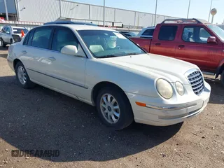 2004 Kia Amanti z VIN KNALD124745028164, wystawiony jako IAAI lot #41855331 z przebiegiem 165 072 mil mil oraz . Historia ofert i sprzedaży dostępna na DreamBid. Obrazek 1.