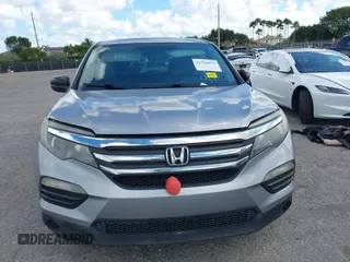 2016 Honda Pilot LX with VIN 5FNYF6H1XGB099987, listed as a IAAI auction lot 41556979 with 98,373 mi miles. Bid and sale history available at carsss.com. Image 12.