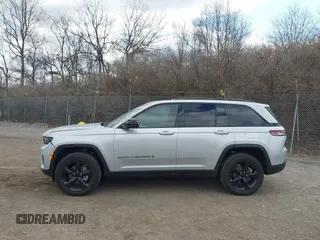 2023 Jeep Grand Cherokee Laredo with VIN 1C4RJHAG2PC660418, listed as a IAAI auction lot 41693879 with 4,295 mi miles and . Bid and sale history available at DreamBid. Image 14.