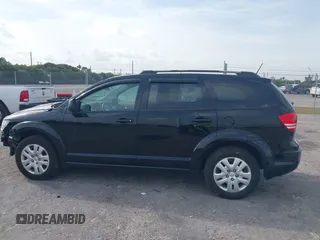 2017 Dodge Journey SE with VIN 3C4PDCAB4HT691343, listed as a IAAI auction lot 41863725 with 99,519 mi miles and . Bid and sale history available at carsss.com. Image 14.