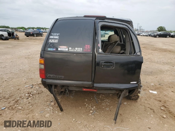 2002 Chevrolet Tahoe LS with VIN 1GNEC13Z52R230281, listed as a Copart auction lot 53447985 with 309,170 mi miles and Salvage title. Bid and sale history available at DreamBid. Image 6.