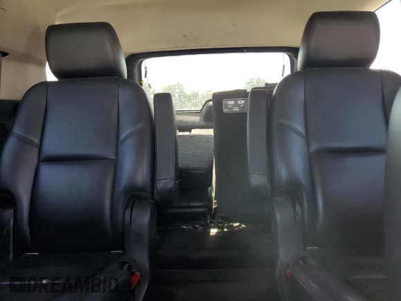 2014 Chevrolet Tahoe LTZ with VIN 1GNSKCE03ER201981, listed as a Copart auction lot 56421125 with 173,710 mi miles and Salvage title. Bid and sale history available at DreamBid. Image 10.