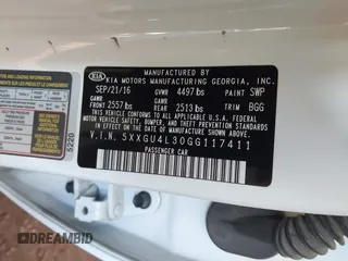 2016 Kia Optima EX with VIN 5XXGU4L30GG117411, listed as a IAAI auction lot 42034988 with 123,387 mi miles. Bid and sale history available at carsss.com. Image 9.