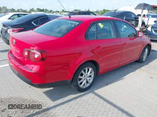 2010 Volkswagen Jetta Sedan S with VIN 3VWJZ7AJ9AM053897, listed as a IAAI auction lot 40300970 with 249,537 mi miles. Bid and sale history available at carsss.com. Image 4.