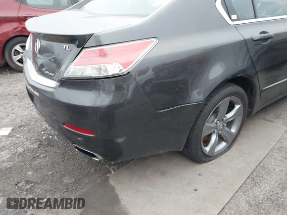 2012 Acura TL Technology z VIN 19UUA9F58CA008692, wystawiony jako IAAI lot #41354545 z przebiegiem 215 580 mil mil oraz . Historia ofert i sprzedaży dostępna na DreamBid. Obrazek 17.