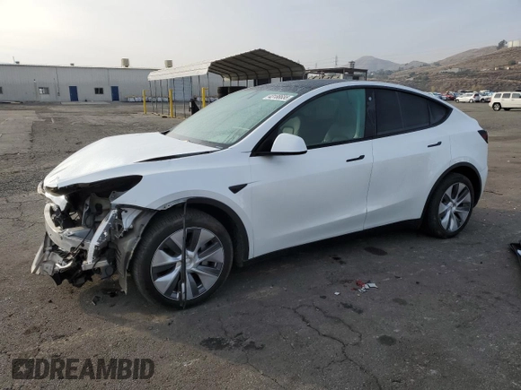 2023 Tesla Model Y Long Range with VIN 7SAYGDEE5PA125887, listed as a Copart auction lot 43188655 with 31,472 mi miles and Salvage Title. Bid and sale history available at DreamBid. Image 1.