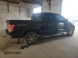2015 Ford F-150 XLT with VIN 1FTEW1EF0FFA69722, listed as a Copart auction lot 59671695 with 189,690 mi miles and Salvage title. Bid and sale history available at DreamBid. Image 3.