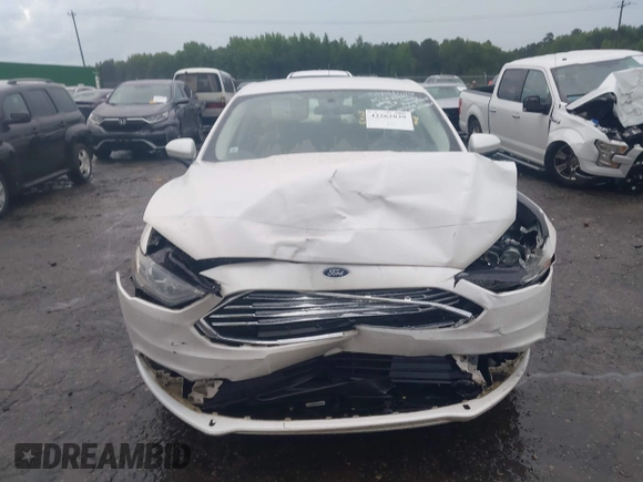 2018 Ford Fusion SE z VIN 3FA6P0H75JR159448, wystawiony jako IAAI lot #42262839 z przebiegiem 144 353 mil mil oraz . Historia ofert i sprzedaży dostępna na DreamBid. Obrazek 12.