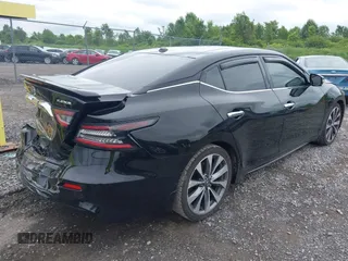 2021 Nissan Maxima Platinum with VIN 1N4AA6FVXMC516268, listed as a IAAI auction lot 42591233 with 138,647 mi miles and . Bid and sale history available at DreamBid. Image 4.