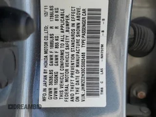 2012 Honda Insight z VIN JHMZE2H30CS003488, wystawiony jako Copart lot #59016385 z przebiegiem Nie podano mil oraz Szkoda całkowita • Salvage title. Historia ofert i sprzedaży dostępna na DreamBid. Obrazek 13.