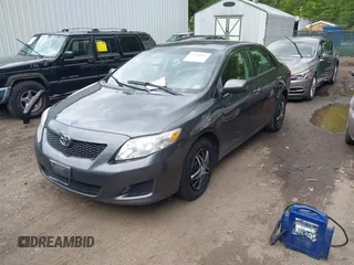 2010 Toyota Corolla with VIN 1NXBU4EE4AZ191047, listed as a IAAI auction lot 42236042 with 252,128 mi miles and . Bid and sale history available at DreamBid. Image 2.