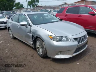2014 Lexus ES 330 with VIN JTHBK1GGXE2101598, listed as a IAAI auction lot 42535661 with 63,906 mi miles and . Bid and sale history available at DreamBid. Image 1.