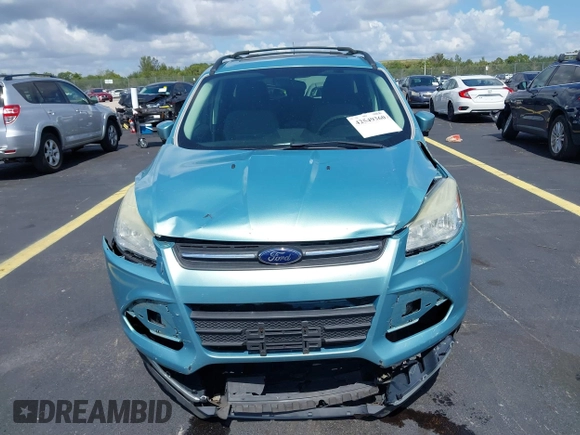 2013 Ford Escape SE with VIN 1FMCU9GX0DUC75662, listed as a IAAI auction lot 42549360 with 156,666 mi miles and . Bid and sale history available at DreamBid. Image 6.