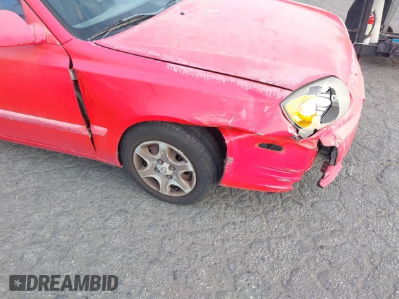 2003 Hyundai Accent GL z VIN KMHCG35C23U238969, wystawiony jako IAAI lot #41462884 z przebiegiem 156 682 mil mil oraz . Historia ofert i sprzedaży dostępna na DreamBid. Obrazek 12.