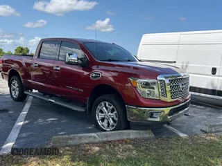2016 Nissan Titan SL z VIN 1N6BA1F26GN512666, wystawiony jako Copart lot #59731495 z przebiegiem 120 182 mil mil oraz Czysty tytuł • Clean title. Historia ofert i sprzedaży dostępna na DreamBid. Obrazek 1.